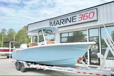 Slide: The Image of 2026 Sea Hunt Ultra 255 SE boat on trailer at Marine 360 dealership. - 2