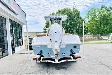 Slide: The Image of 2026 Sea Hunt Ultra 255 SE boat on trailer, rear view, outdoors. - 3