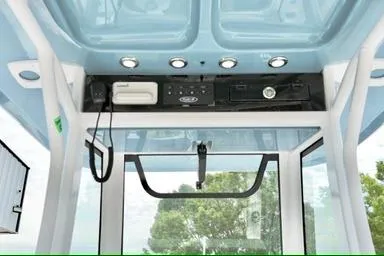 Slide: The Image of 2026 Sea Hunt Ultra 255 SE boat interior with modern controls and lighting. - 9