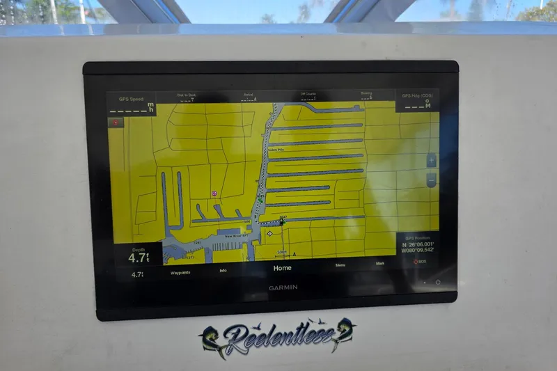 Slide: The Image of Garmin GPS display on 1990 Topaz 39 Royale boat, showing navigation map. - 10