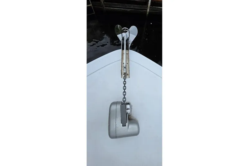 Slide: The Image of Bow of 1990 Topaz 39 Royale with anchor chain and winch. - 24