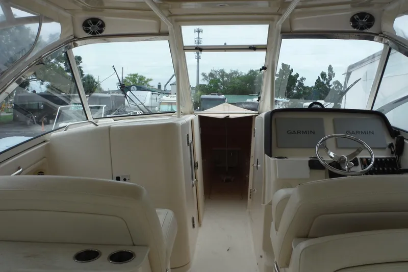 Slide: The Image of Interior view of 2019 Grady-White Freedom 325 boat with Garmin navigation system. - 22