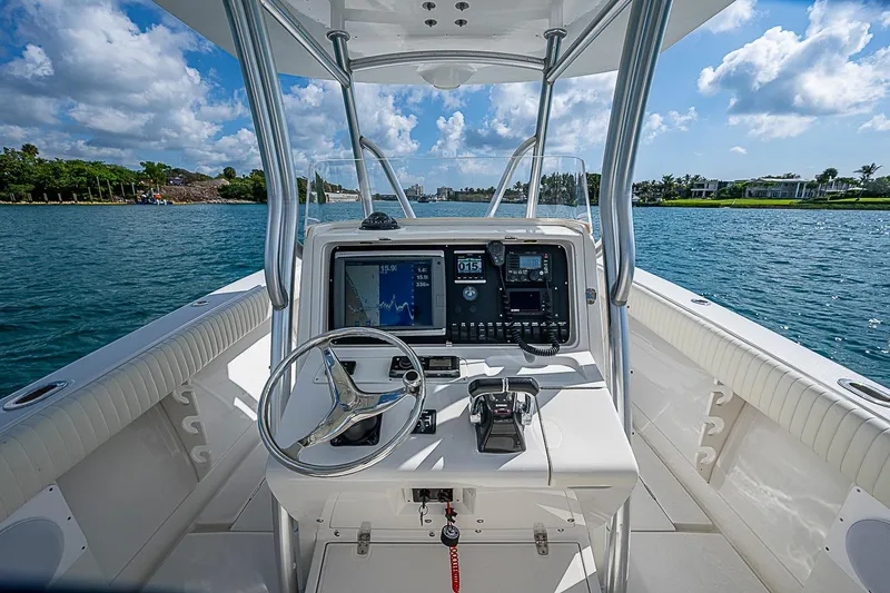 Slide: The Image of Center console of a 2007 Jupiter 29 FS boat on a sunny day. - 9