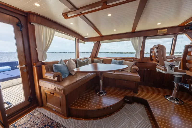 Slide: The Image of Luxurious interior of 2022 Hunt Yachts Ocean 76EP with leather seating and panoramic windows. - 14