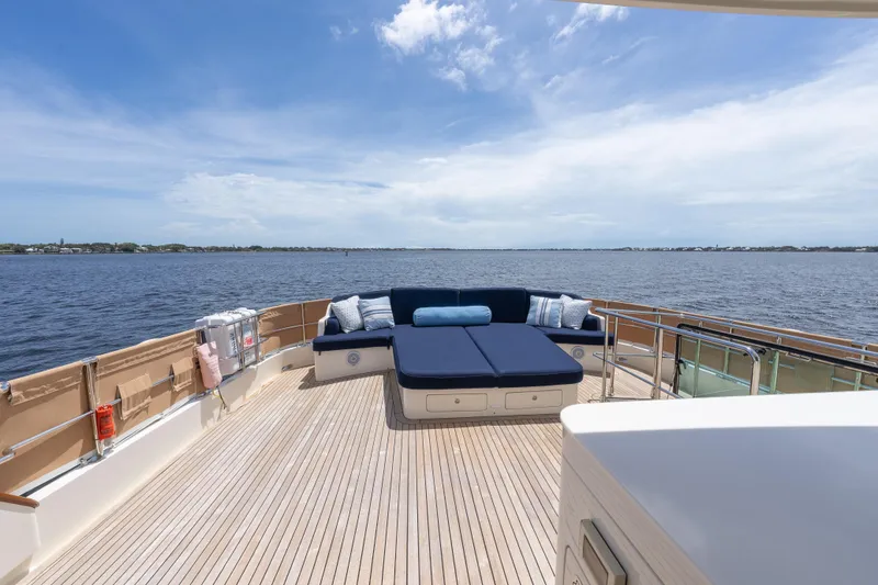 Slide: The Image of Luxurious deck of 2022 Hunt Ocean 76EP yacht with scenic ocean view. - 26