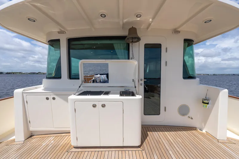 Slide: The Image of Outdoor kitchen on 2022 Hunt Ocean 76EP yacht with ocean view. - 28