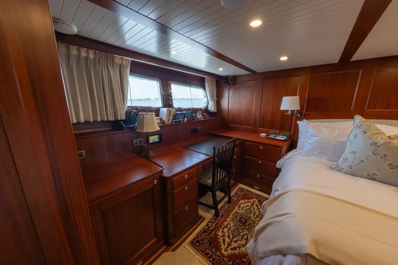 Slide: The Image of Luxurious cabin interior of 2022 Hunt Ocean 76EP yacht with wooden furnishings. - 31