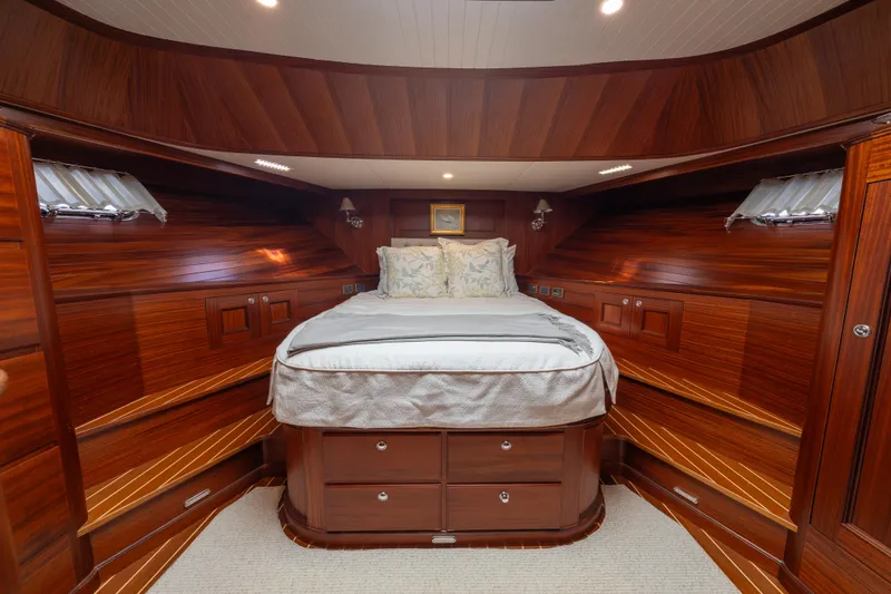 Slide: The Image of Luxurious wooden cabin interior of 2022 Hunt Ocean 76EP yacht with cozy bed. - 33