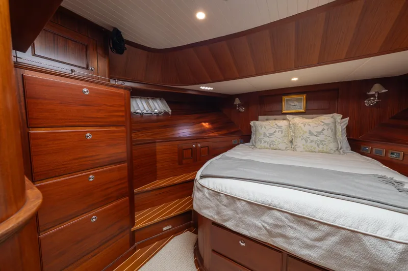 Slide: The Image of Luxurious wooden cabin interior of 2022 Hunt Ocean 76EP yacht with cozy bed and drawers. - 34
