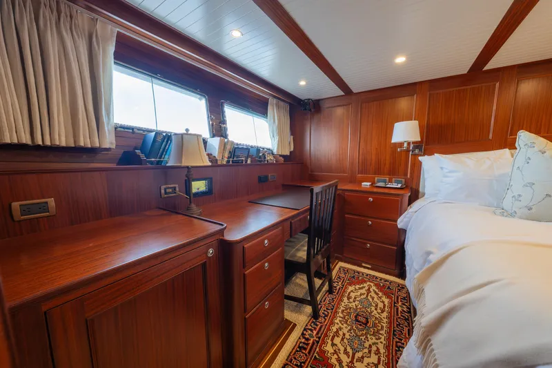 Slide: The Image of Luxurious cabin interior of 2022 Hunt Yachts Ocean 76EP with elegant wood finish. - 42
