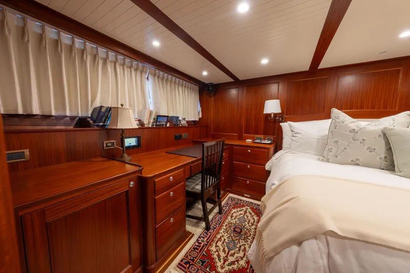 Slide: The Image of Luxurious cabin interior of 2022 Hunt Ocean 76EP yacht with elegant wood finish. - 45
