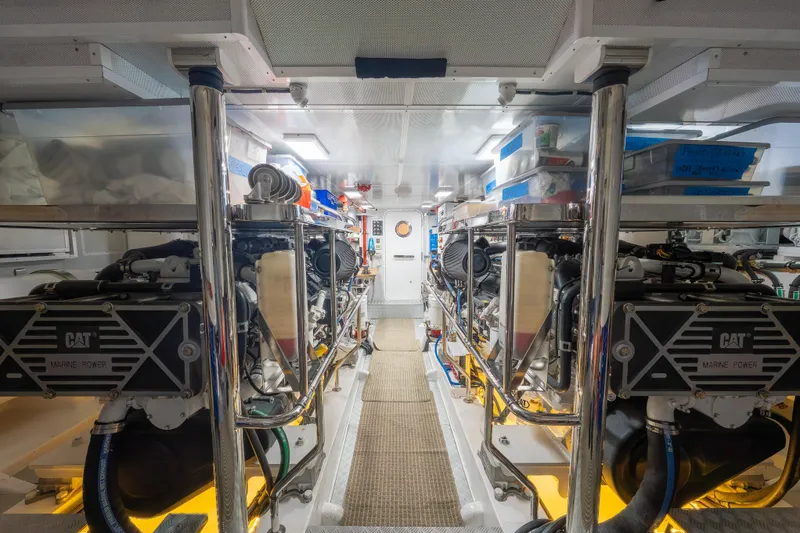 Slide: The Image of Engine room of 2022 Hunt Yachts Ocean 76EP with CAT marine power engines. - 59