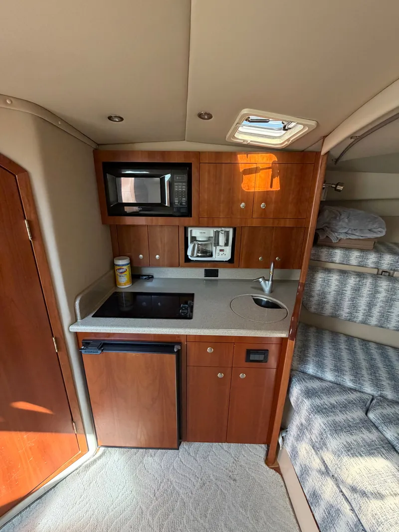 Slide: The Image of Galley in a 2005 Rampage 33 Express yacht. - 32
