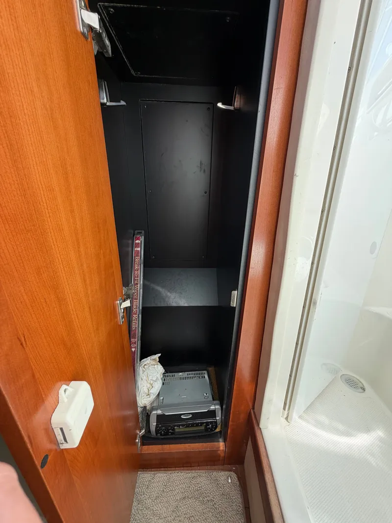 Slide: The Image of Open cabinet in Rampage 33 Express boat, year 2005. - 38