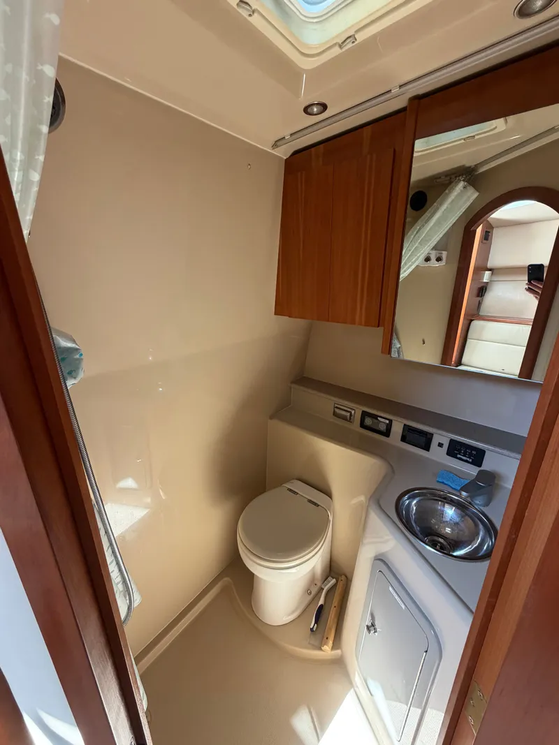 Slide: The Image of Interior of 2005 Rampage 33 Express with bathroom and toilet. - 39