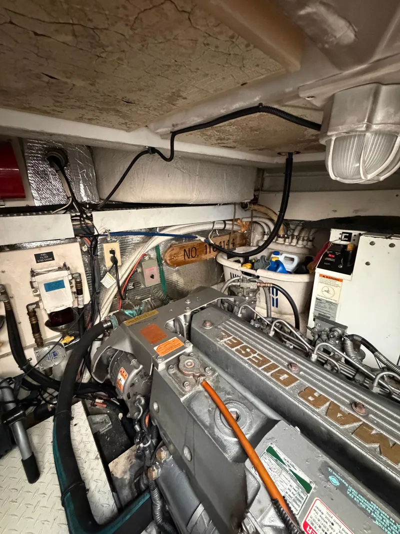 Slide: The Image of Engine room of a 2005 Rampage 33 Express boat with diesel engine. - 49