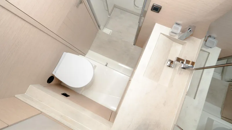 Slide: The Image of Modern bathroom in 2023 Prestige 520S yacht, featuring sleek fixtures and minimalist design. - 19