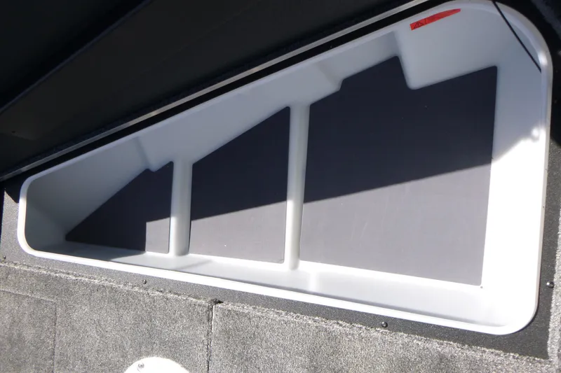 Slide: The Image of Storage compartment in 2025 Alumacraft Trophy 175X Sport boat interior. - 9