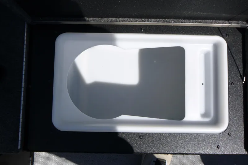 Slide: The Image of Livewell compartment in 2025 Alumacraft Trophy 185X Sport boat. - 16