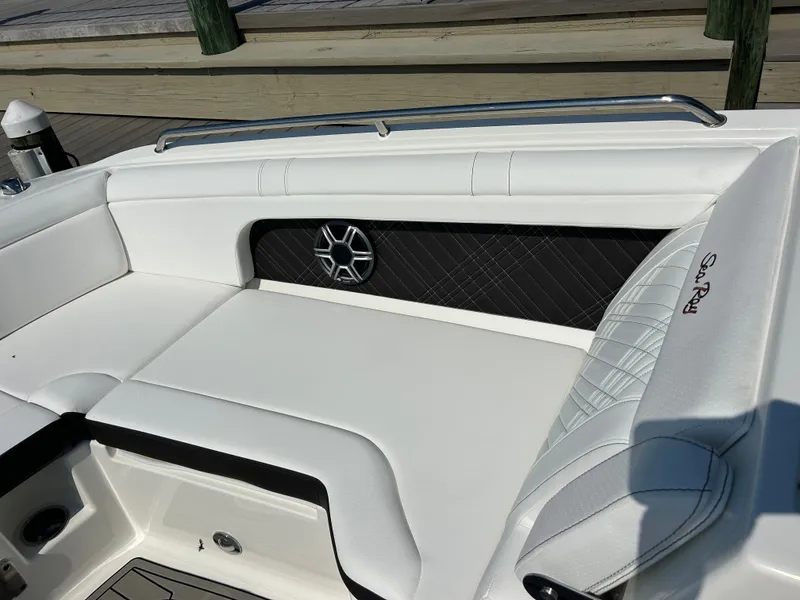 Slide: The Image of The 2027 Sea Ray SDX 290 Outboard features sleek white upholstery and a modern design. - 24
