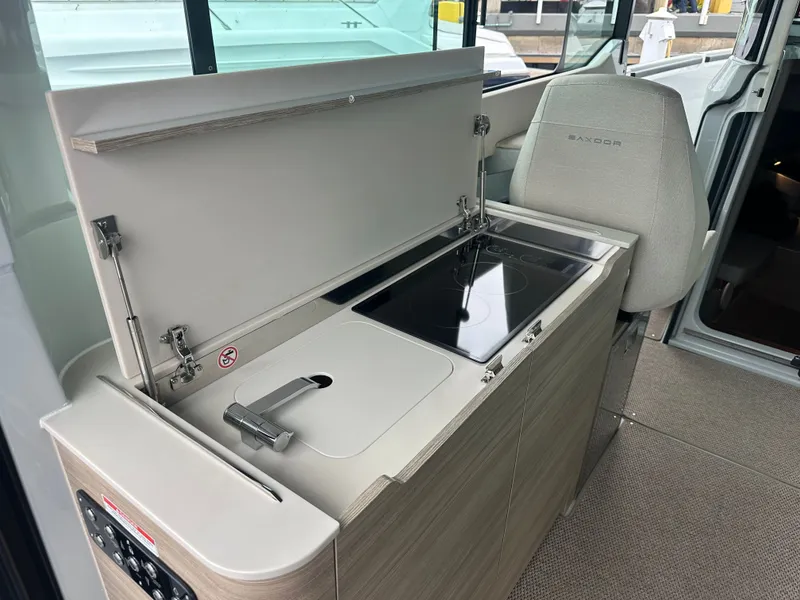 Slide: The Image of electric burner electric stove and sink with cover - 10