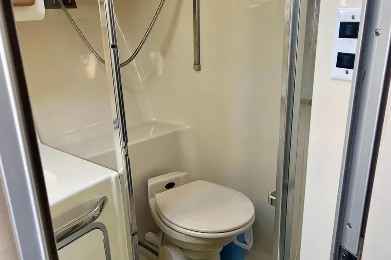Slide: The Image of Bathroom of the 1994 Sea Ray 370 Express Cruiser. - 27