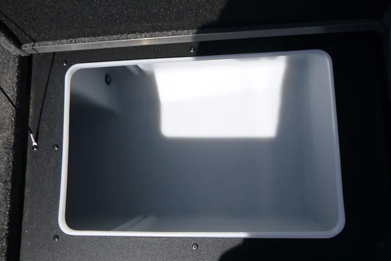 Slide: The Image of Spacious storage compartment in 2025 Alumacraft Trophy 185X Sport boat. - 15