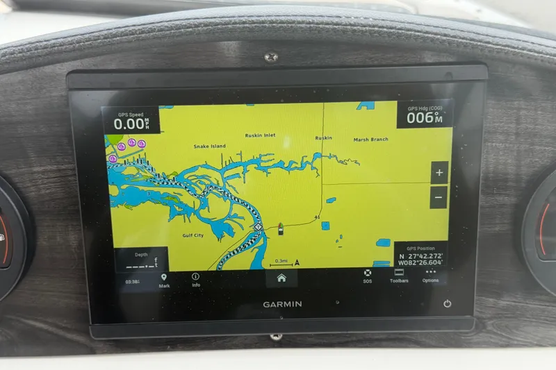 Slide: The Image of Garmin GPS display on 2023 Stingray 231 DC boat, showing navigation map and coordinates. - 24