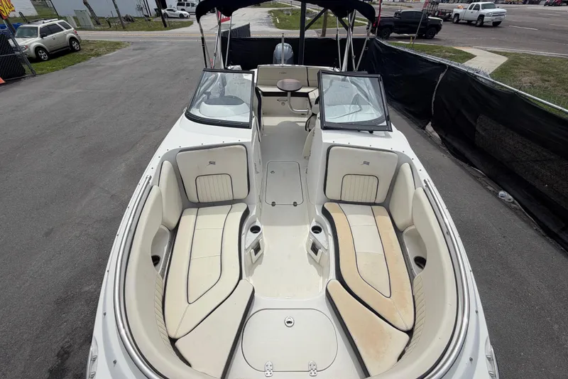 Slide: The Image of 2023 Stingray 231 DC boat interior with spacious seating and modern design. - 43
