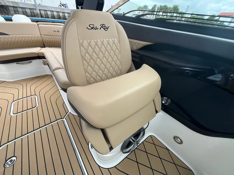 Slide: The Image of Luxurious seating in the 2027 Sea Ray SLX 280 Outboard, featuring quilted leather and sleek details. - 20