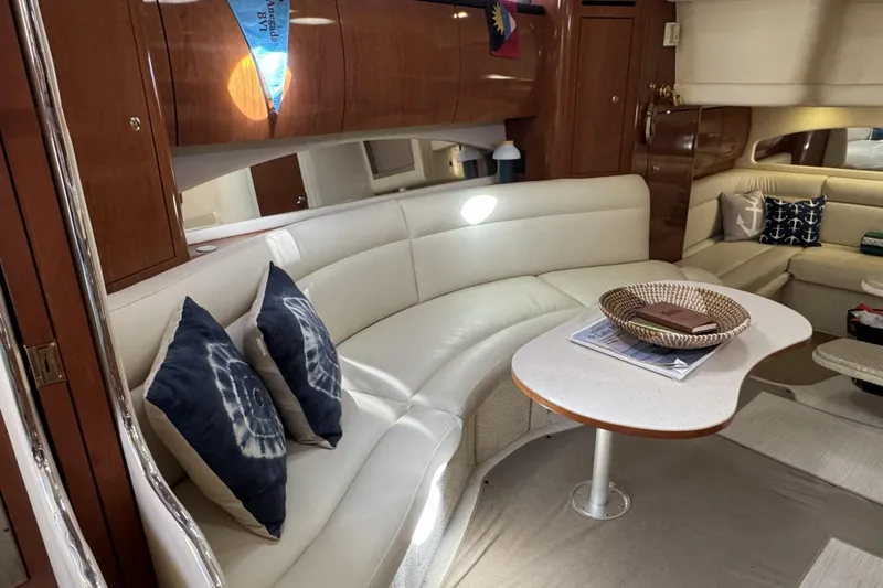 Slide: The Image of Luxurious interior of 2002 Sea Ray 360 Sundancer yacht with elegant seating and decor. - 21