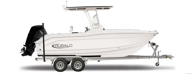 Slide: The Image of A white Robalo R202 Explorer boat on a trailer, featuring a black outboard motor. - 14