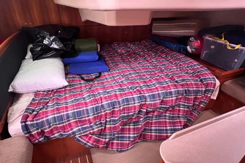 Slide: The Image of Interior of a 2006 Hunter 38 yacht with cozy bed. - 20