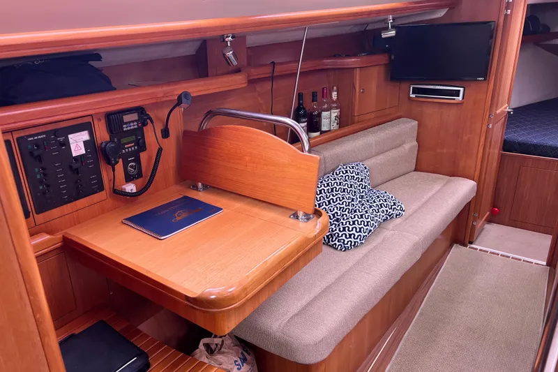 Slide: The Image of Interior of a 2006 Hunter 38 yacht with wooden furnishings. - 24