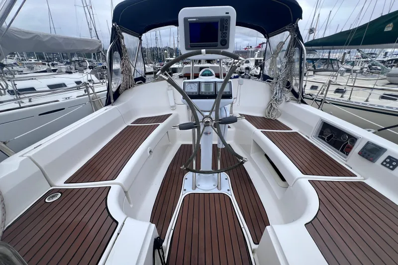 Slide: The Image of Cockpit of a 2006 Hunter 38 sailboat in the marina. - 3