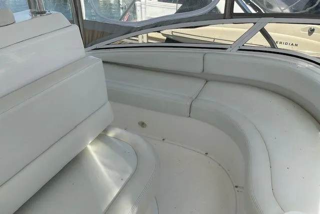 Slide: The Image of Interior seating area of a 2000 Silverton 41 Convertible boat. - 30