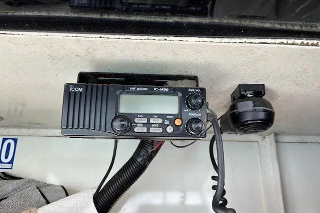 Slide: The Image of Icom VHF marine radio installed on a 2000 Silverton 41 Convertible boat. - 36
