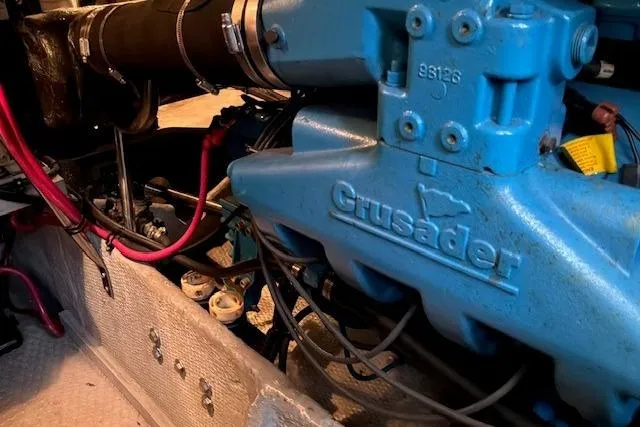 Slide: The Image of Engine compartment of a 2000 Silverton 41 Convertible boat with Crusader engine. - 40