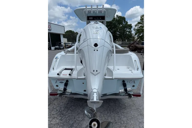 Slide: The Image of 2026 Sea Hunt Ultra 235 SE boat rear view with outboard motor. - 3