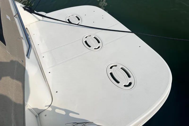 Slide: The Image of 1997 Sea Ray 270 Sundancer swim platform with cleats and water access. - 5