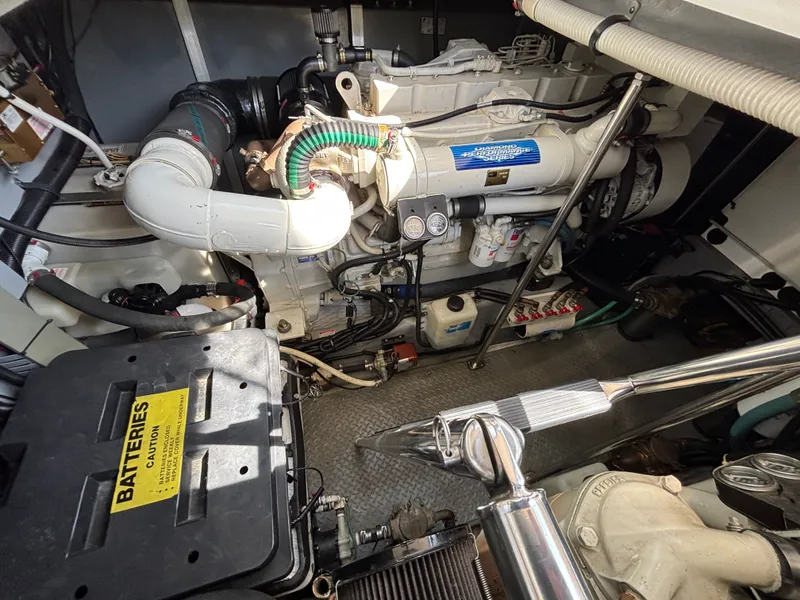 Slide: The Image of Engine room of a 2000 Sea Ray Sundancer 460 with battery and engine. - 25