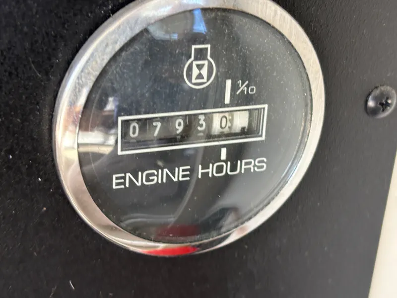 Slide: The Image of 2000 Sea Ray Sundancer 460 engine hour meter showing 793 hours. - 29