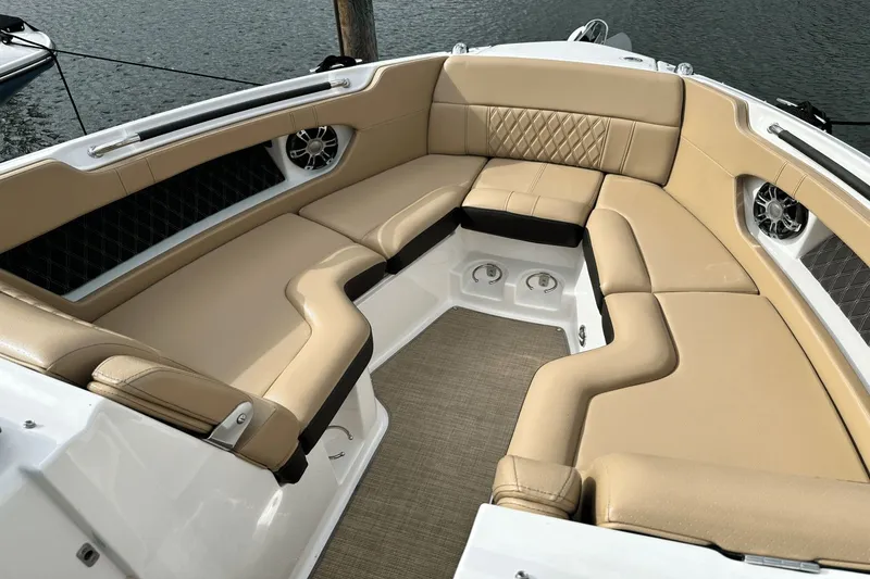 Slide: The Image of Interior of a 2019 Sea Ray SLX 250 with luxurious seating. - 16