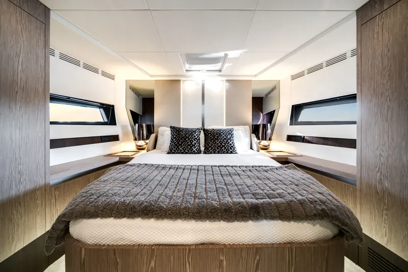 Slide: The Image of Luxurious bedroom with large windows and stylish decor on an Azimut S6 yacht. - 39