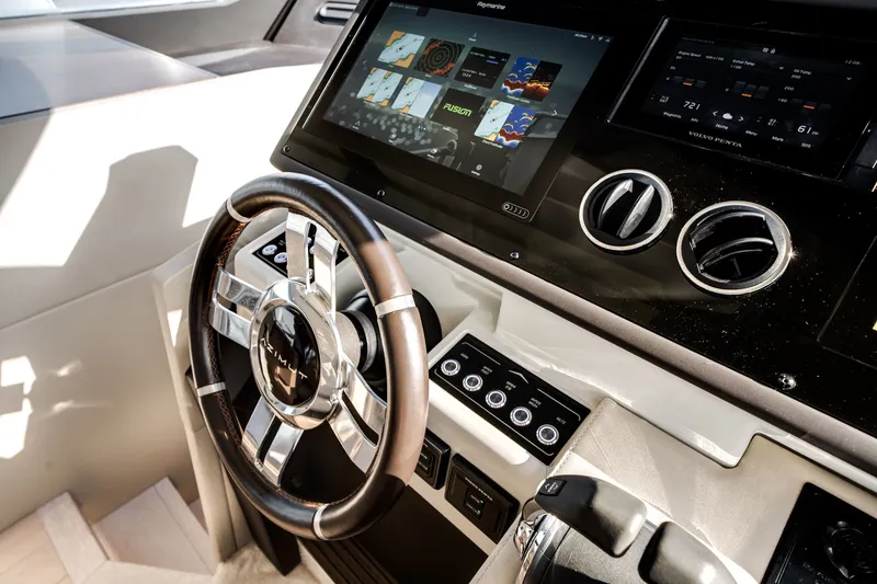 Slide: The Image of Helm of the 2021 Azimut S6 with modern display and steering wheel. - 32