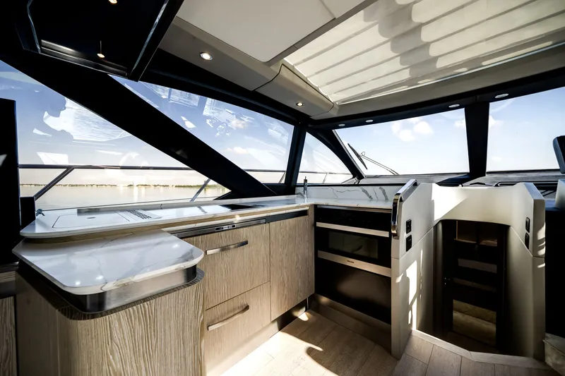 Slide: The Image of Interior of the 2021 Azimut S6 with modern kitchen and panoramic windows. - 37