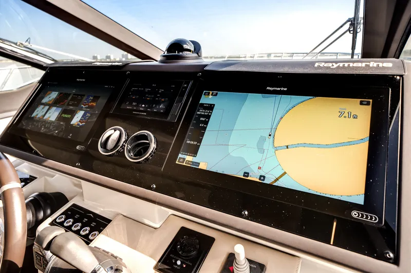 Slide: The Image of The dashboard of a 2021 Azimut S6 with modern navigation screens. - 28