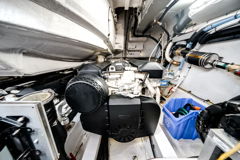 Slide: The Image of Engine room of an Azimut S6 yacht with visible engine and piping. - 67