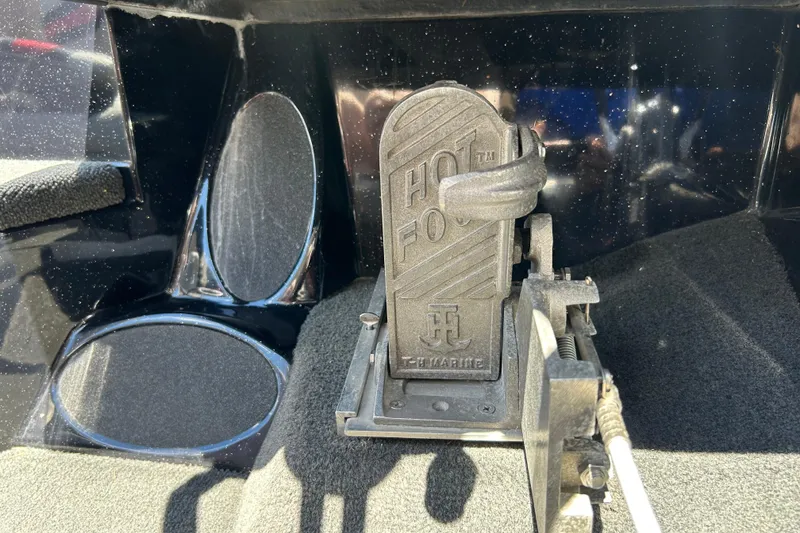 Slide: The Image of Bass Cat Lynx 2018 boat foot pedal, labeled "Hot Foot," on carpeted surface. - 12