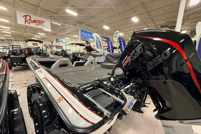 Slide: The Image of 2018 Bass Cat Lynx boat with powerful 250 Pro XS engine in showroom display. - 4